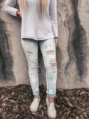 RIPPED STAR SKINNY JEANS